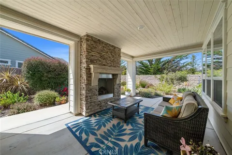 a outdoor living space with furniture and a potted plant