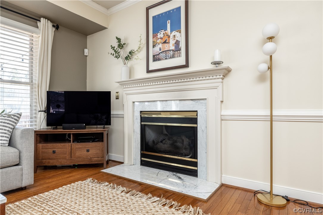 13900 Sagebrook Road Midlothian, VA 23112 - Photo 18 of 44 a living room with furniture a flat screen tv and a fireplace