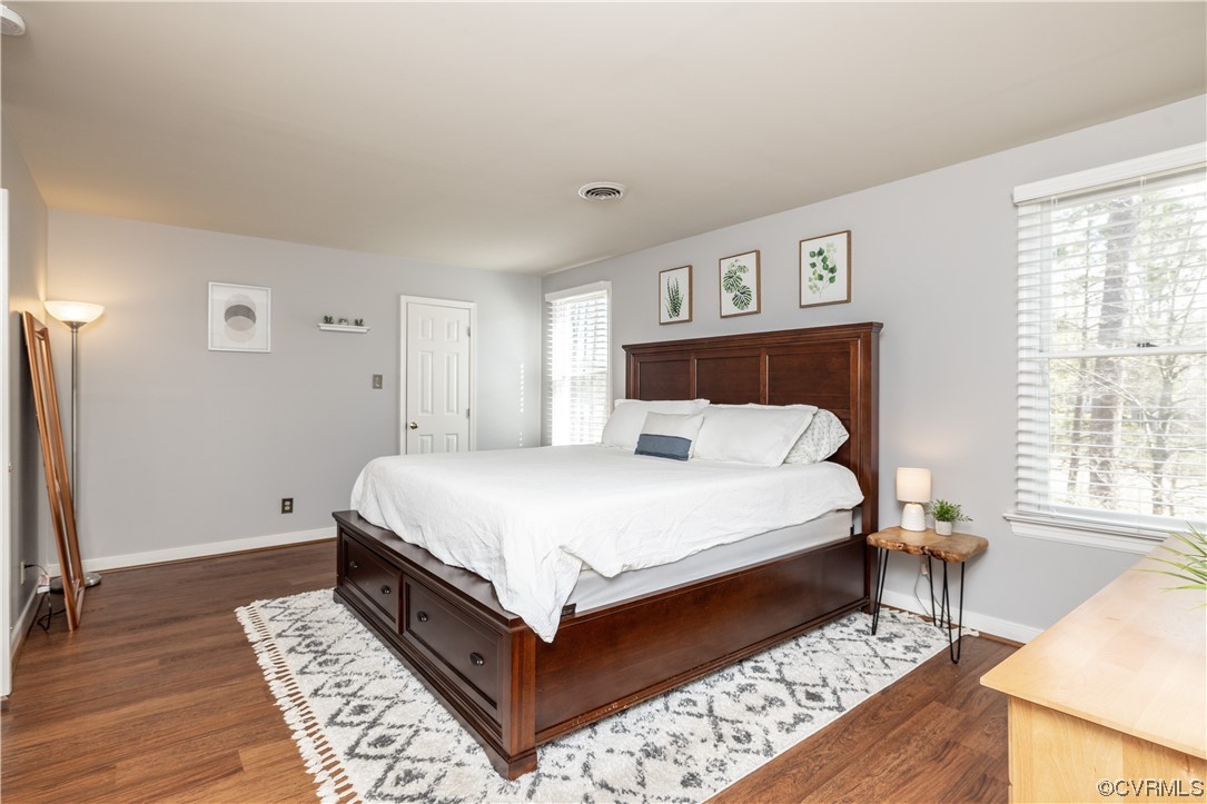 13900 Sagebrook Road Midlothian, VA 23112 - Photo 21 of 44 a bed room with a bed and a night stand