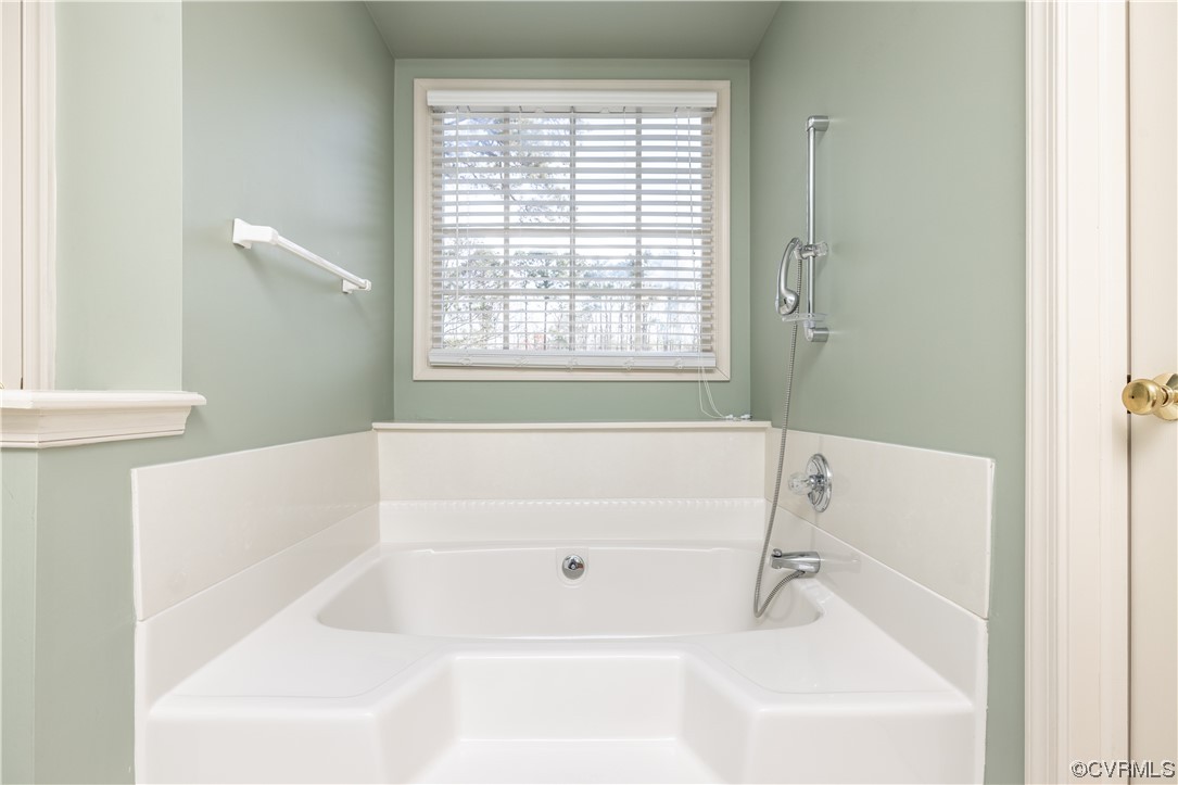 13900 Sagebrook Road Midlothian, VA 23112 - Photo 24 of 44 a white bath tub sitting next to a white sink