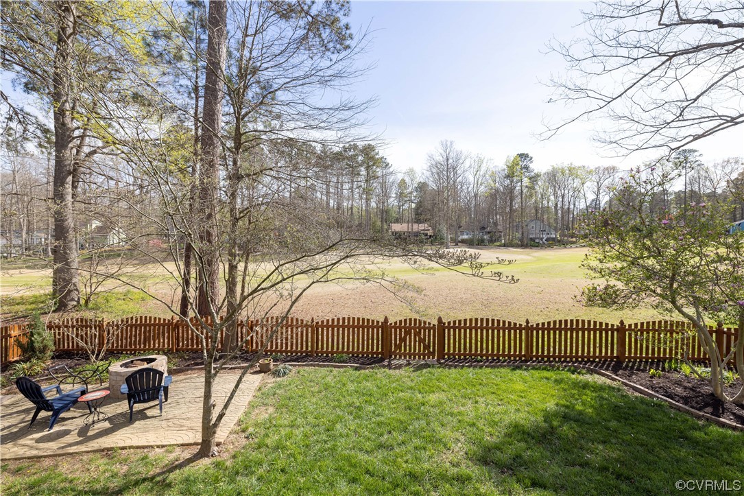 13900 Sagebrook Road Midlothian, VA 23112 - Photo 35 of 44 a view of a garden with trees in front of house