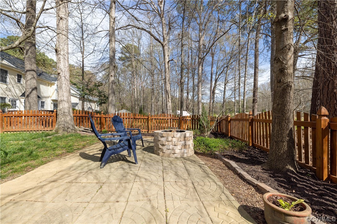 13900 Sagebrook Road Midlothian, VA 23112 - Photo 38 of 44 a view of a bench in a backyard