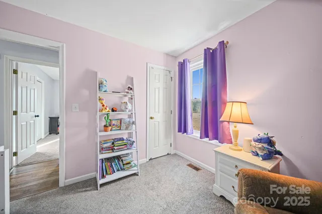 a room with furniture and window