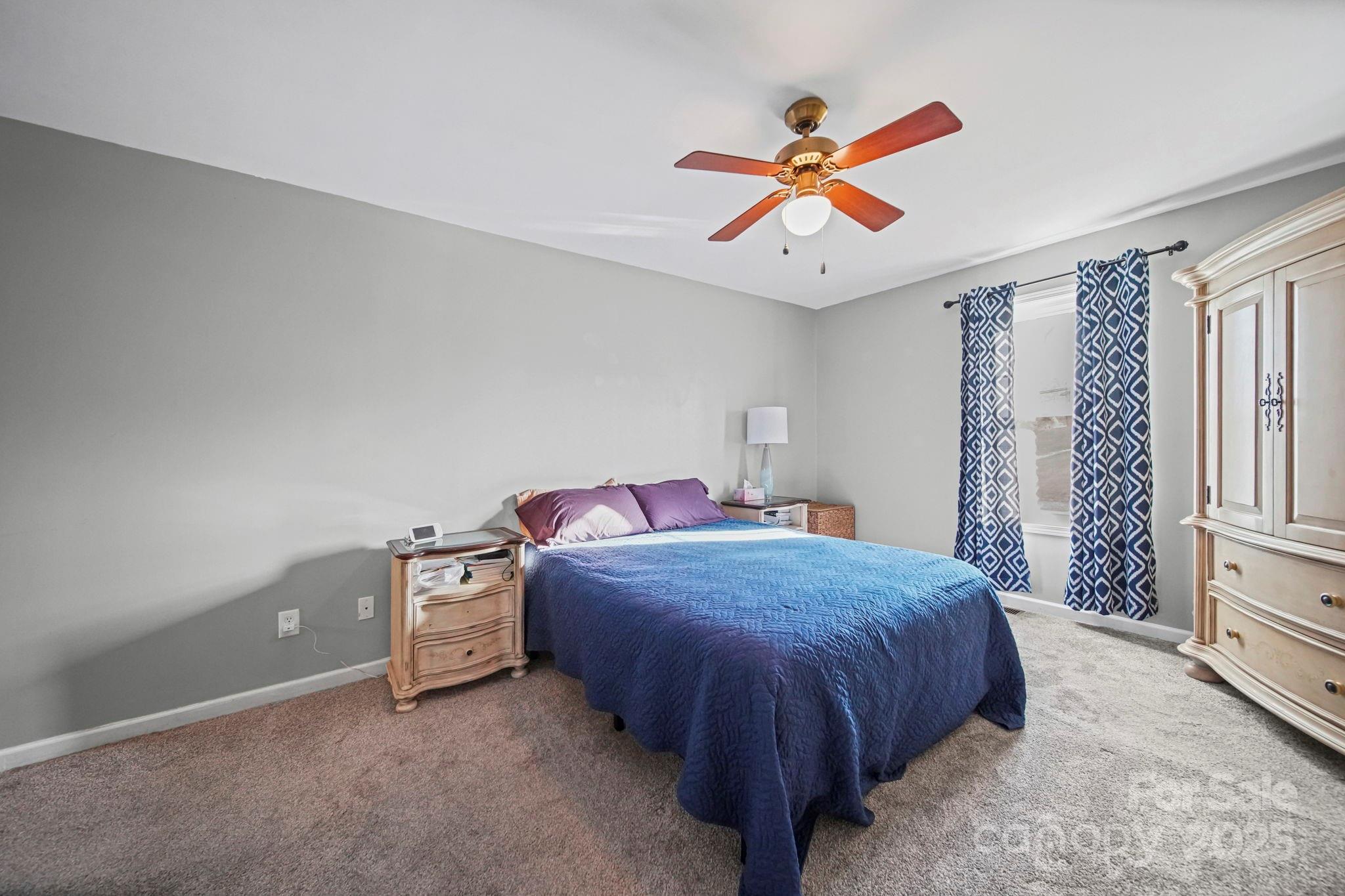 620 Pleasant Avenue Kannapolis, NC 28081 - Photo 18 of 24 a bedroom with a bed and window