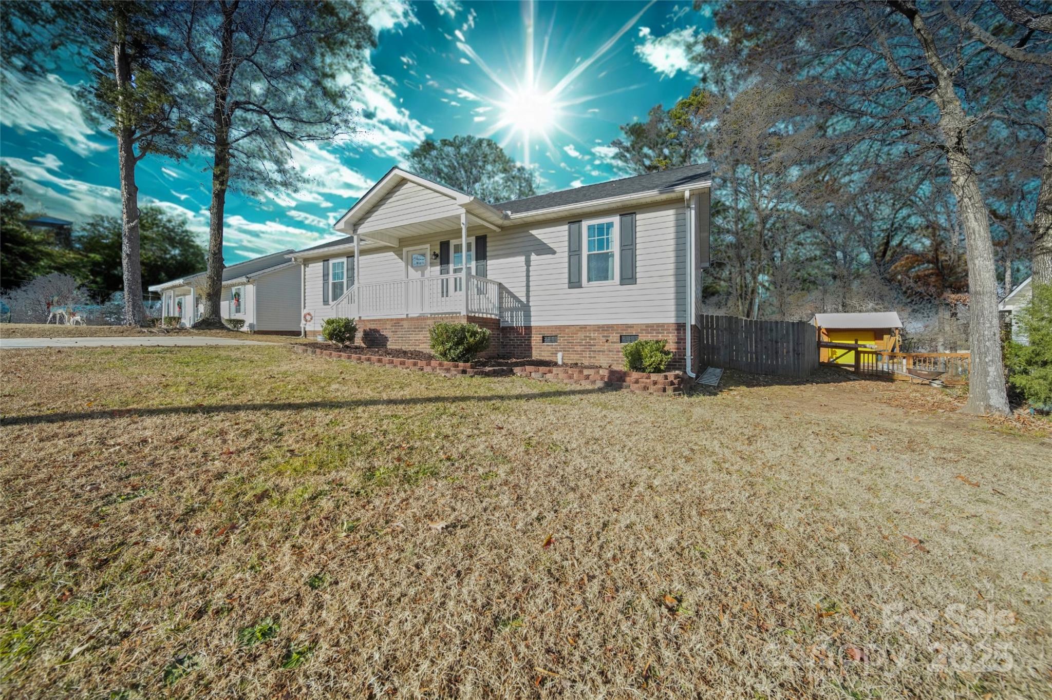 620 Pleasant Avenue Kannapolis, NC 28081 - Photo 20 of 24 a view of a house with a yard and large tree