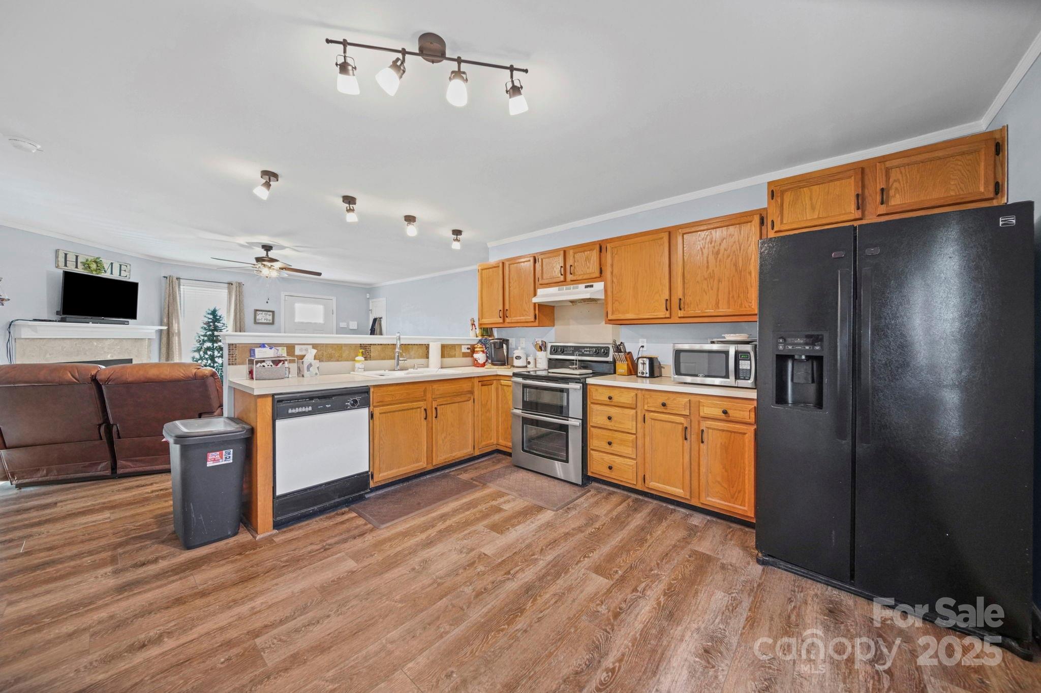620 Pleasant Avenue Kannapolis, NC 28081 - Photo 8 of 24 a kitchen with stainless steel appliances a refrigerator a sink dishwasher stove and oven