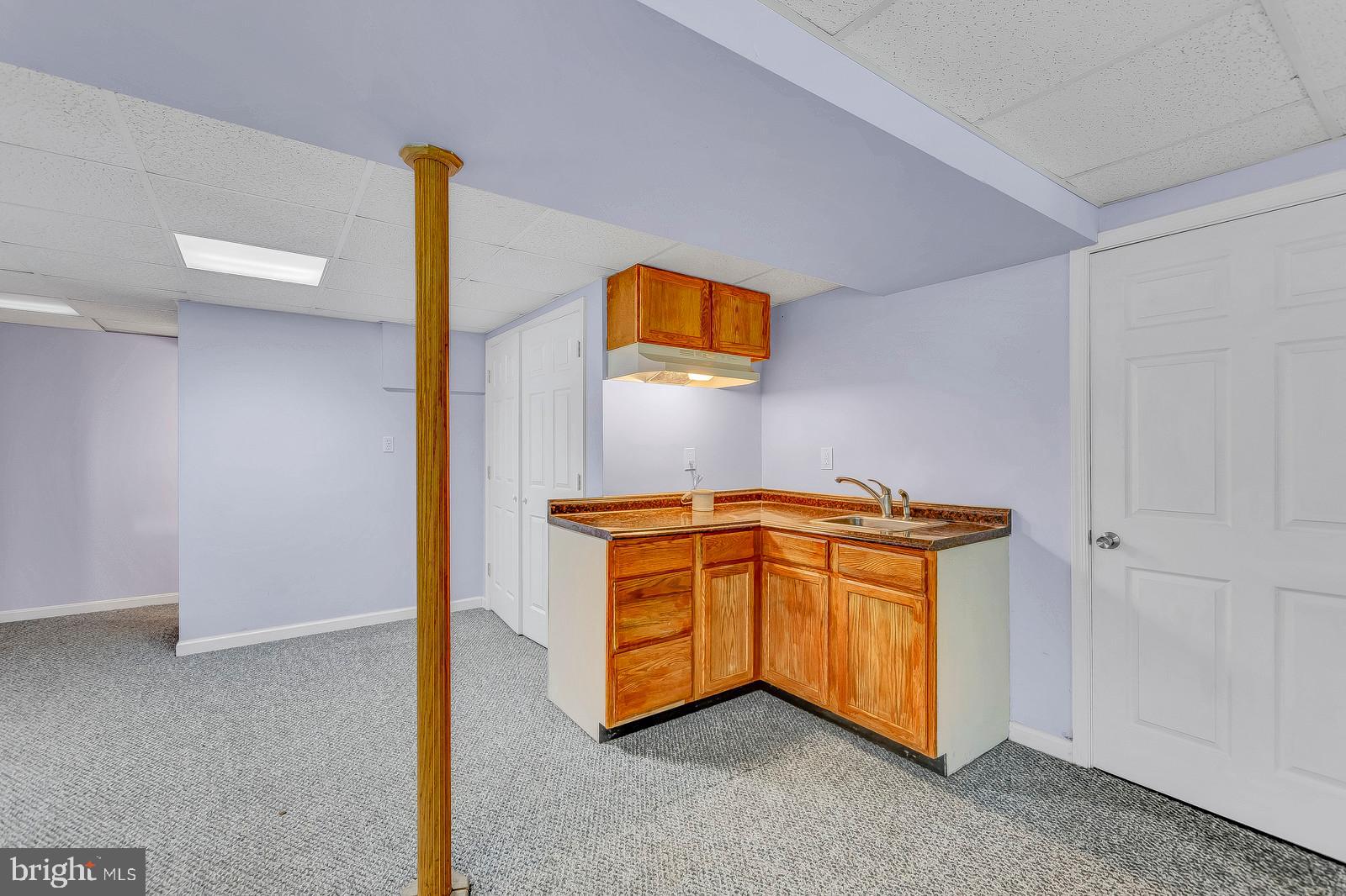 701 Small Reward Road Huntingtown, MD 20639 - Photo 49 of 63 Bar in basement