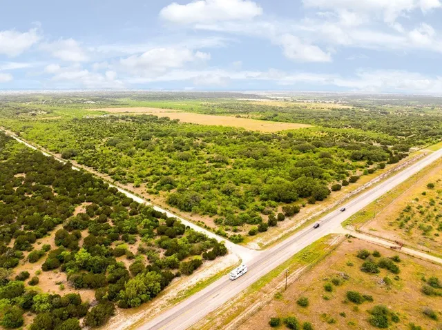 a view of a swimming pool with a garden