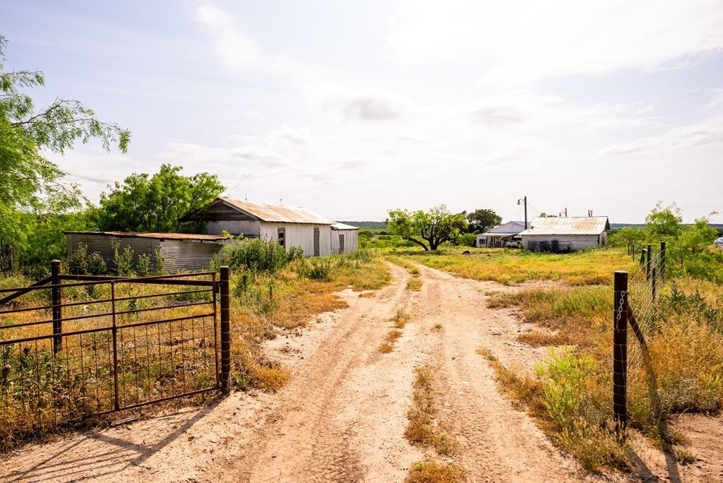 12757 State Highway Menard, TX 76859 - Photo 54 of 70 a view of swimming pool with a yard