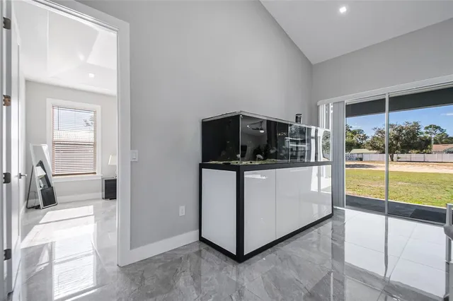 a view of living room and kitchen with flat screen tv