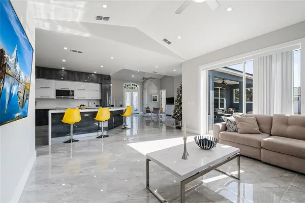 a living room with furniture and a table