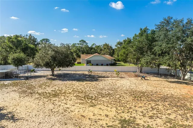 an aerial view of residential house with outdoor space