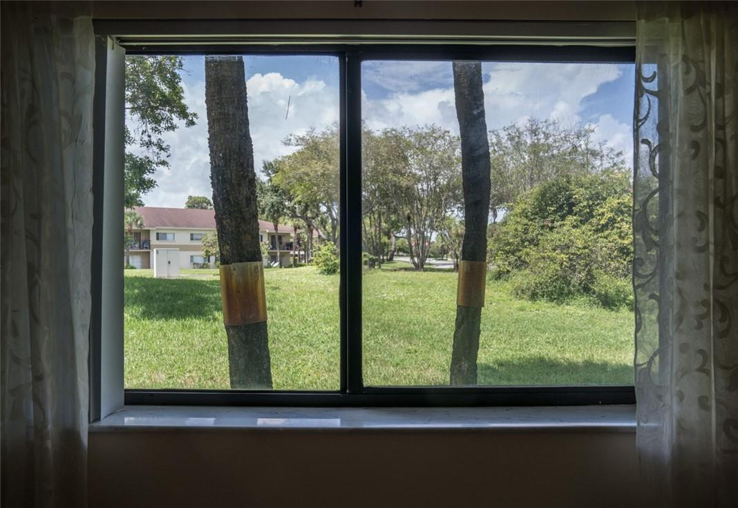 523 Trace Circle, Unit 106 Deerfield Beach, FL 33441 - Photo 18 of 26 a view of a room with window