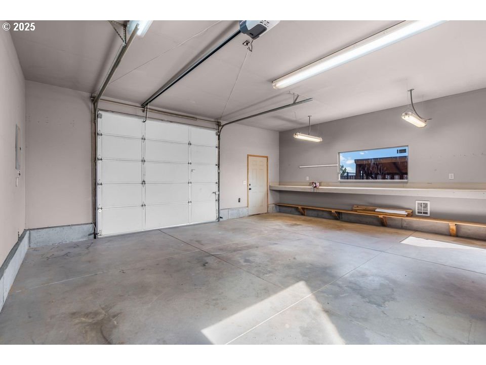 14515 Southwest Maverick Road Terrebonne, OR 97760 - Photo 17 of 39 a view of an empty room with a kitchen