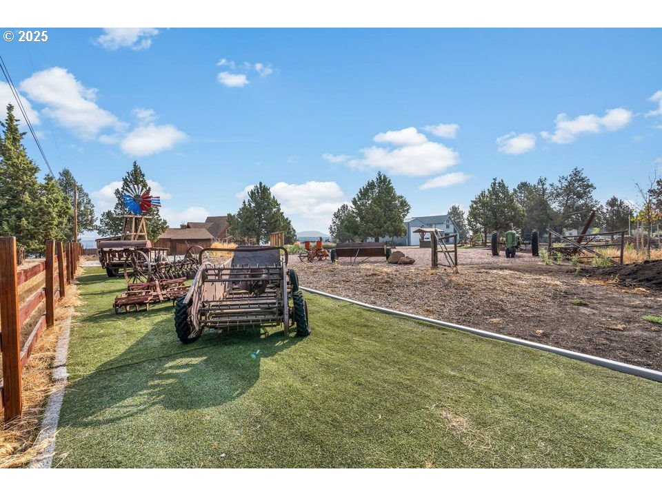 14515 Southwest Maverick Road Terrebonne, OR 97760 - Photo 30 of 39 a car parked in the middle of a field