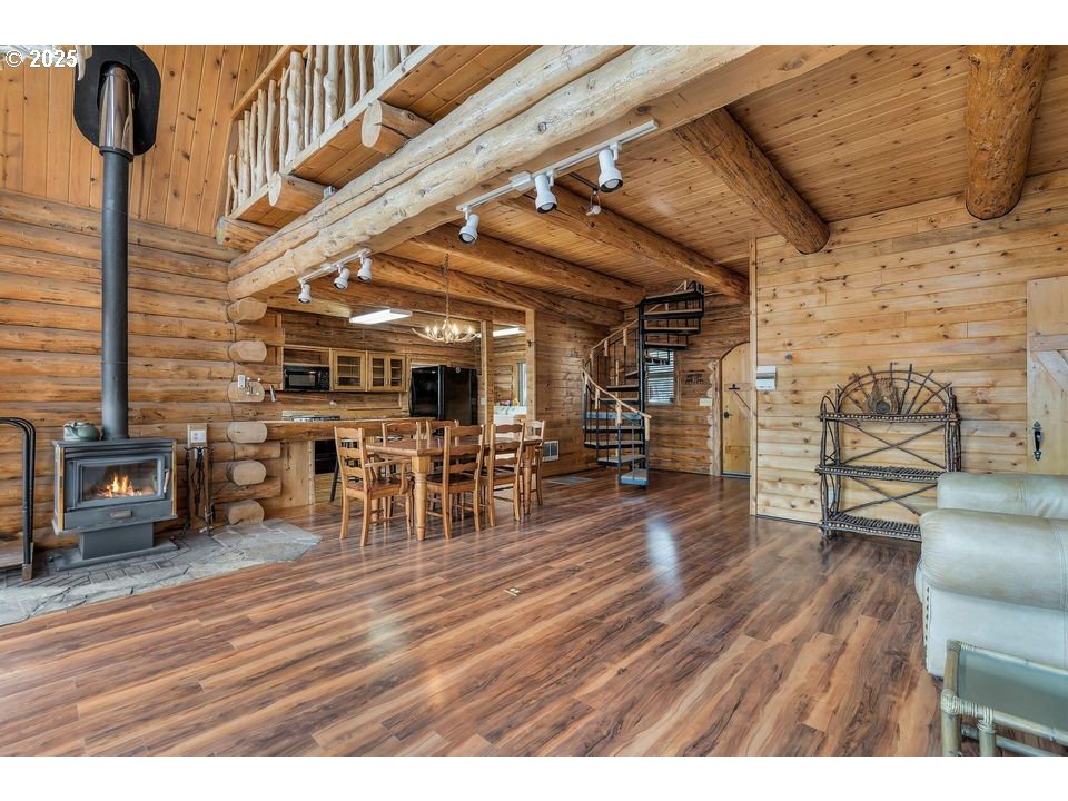 14515 Southwest Maverick Road Terrebonne, OR 97760 - Photo 36 of 39 a room with lots of wooden furniture and a wooden floor