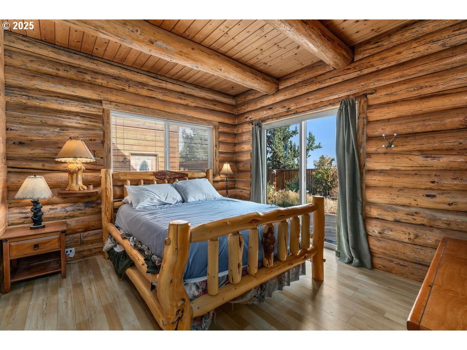 14515 Southwest Maverick Road Terrebonne, OR 97760 - Photo 39 of 39 a bedroom with a bed next to a window