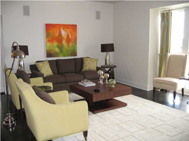 136 Unit Ave Inlet Beach, Unit 3B 1 Inlet Beach, FL 32461 - Photo 4 of 8 a living room with furniture and a flat screen tv