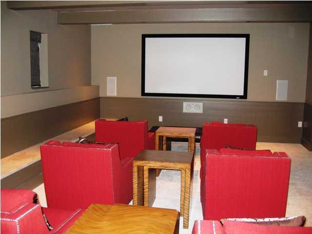 136 Unit Ave Inlet Beach, Unit 3B 1 Inlet Beach, FL 32461 - Photo 6 of 8 a living room with furniture and a flat screen tv