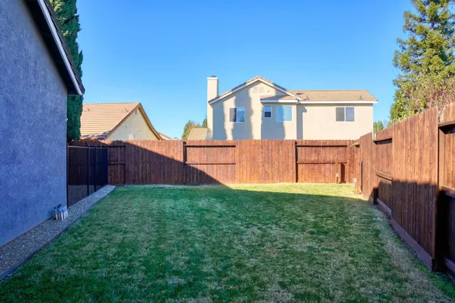 a view of backyard of house