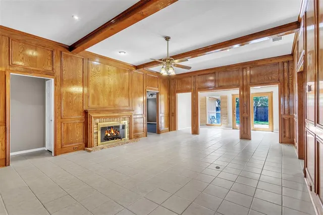 a view of a hallway with an empty room