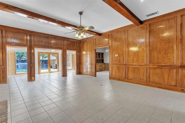 a view of a hallway with a chandelier