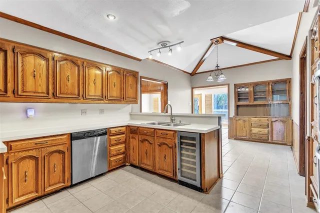 a kitchen with a sink and cabinets