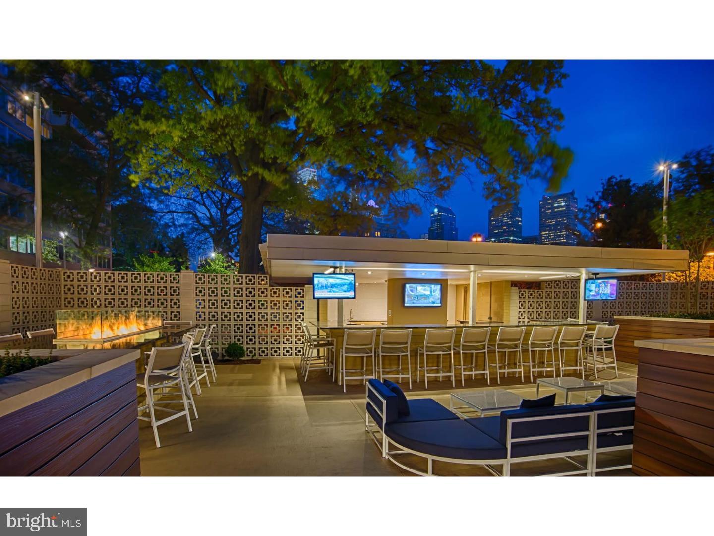 2200 Benjamin Franklin Parkway, Unit 2BN0411 Philadelphia, PA 19130 - Photo 12 of 18 a bathroom with a sink and a mirror