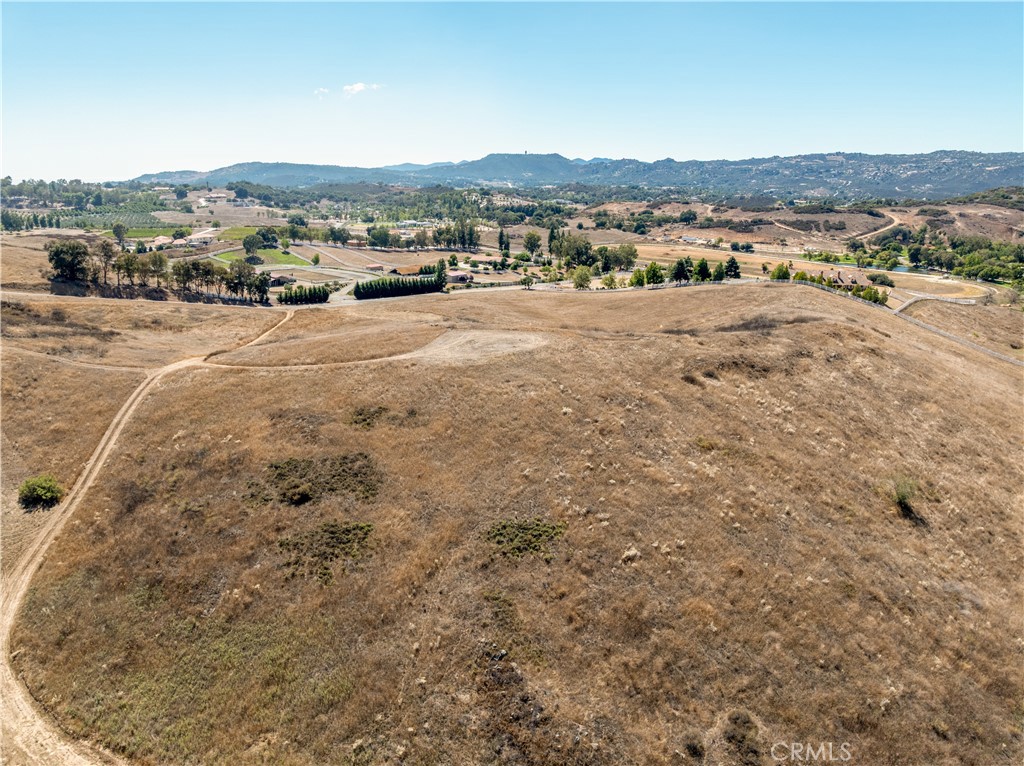 0 Vista Flora Road Murrieta, CA 92562 - Photo 35 of 52 a view of a dry yard with mountain view in city