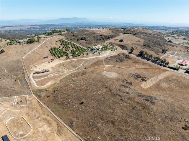 a view of a dry yard with mountain