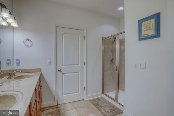 a bathroom with a sink and a washing machine