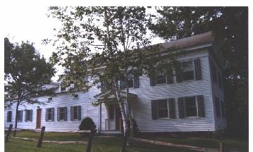 Main Road, Unit 4 Monterey, MA 01245 - Photo 1 of 1 a front view of a house with garden