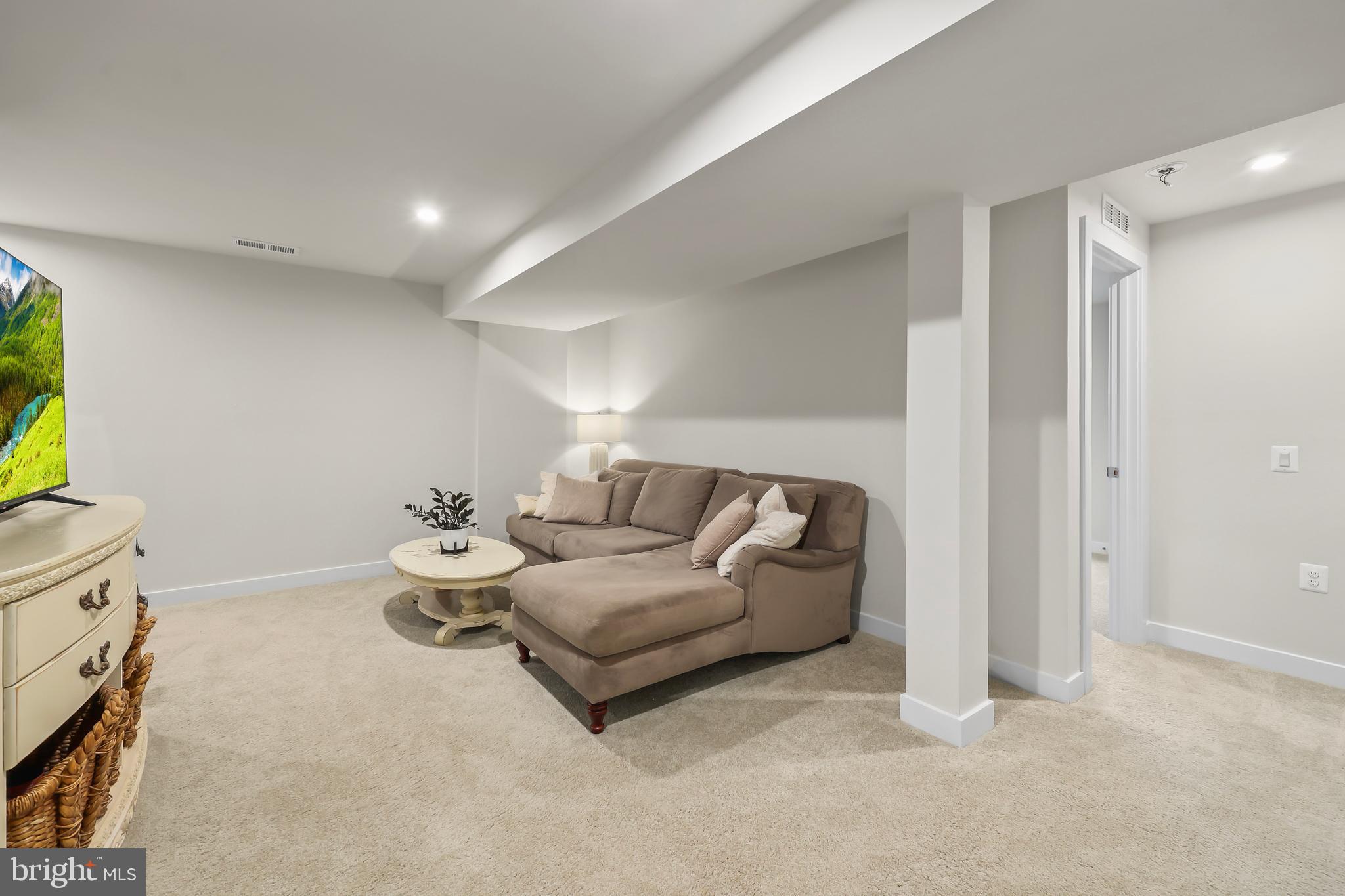 7082 Apprentice Street Ruther Glen, VA 22546 - Photo 24 of 50 Rec room in finished basement