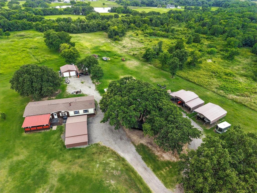 1148 Union Hill Road Ennis, TX 75119 - Photo 2 of 10 an aerial view of a house with pool outdoor seating yard and green space