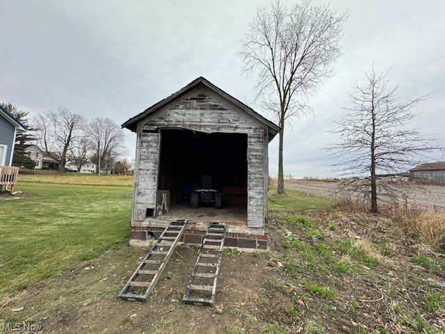 10264 Tallmadge Road Diamond, OH 44412 - Photo 30 of 32 View of shed / structure featuring a lawn