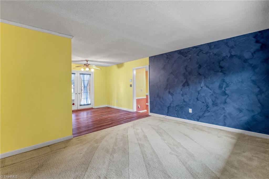 626 Westerly Park Road Eden, NC 27288 - Photo 9 of 33 Living Room looking into dining room and den