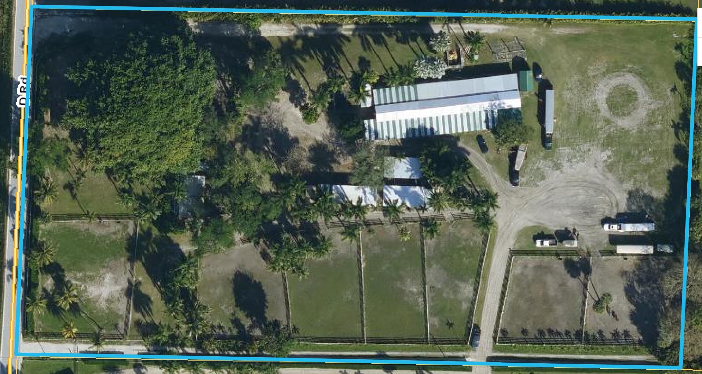 1100 D Road Loxahatchee Groves, FL 33470 - Photo 2 of 24 an aerial view of a house