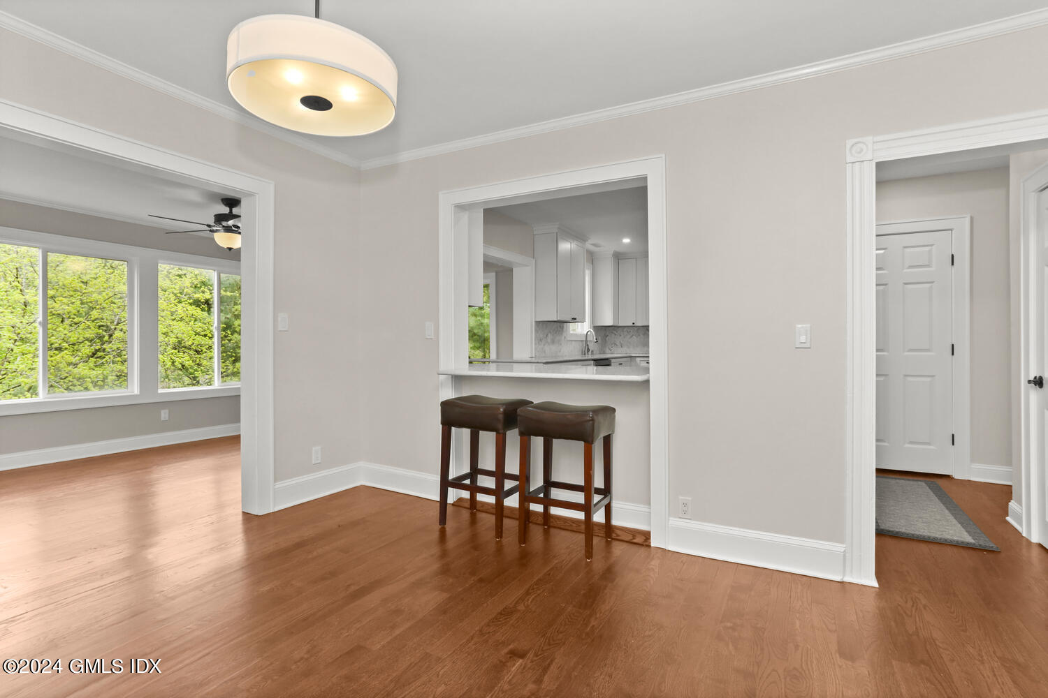 44 Riversville Road, Unit UPSTAIRS Greenwich, CT 06831 - Photo 8 of 24 an empty room with wooden floor and entrance