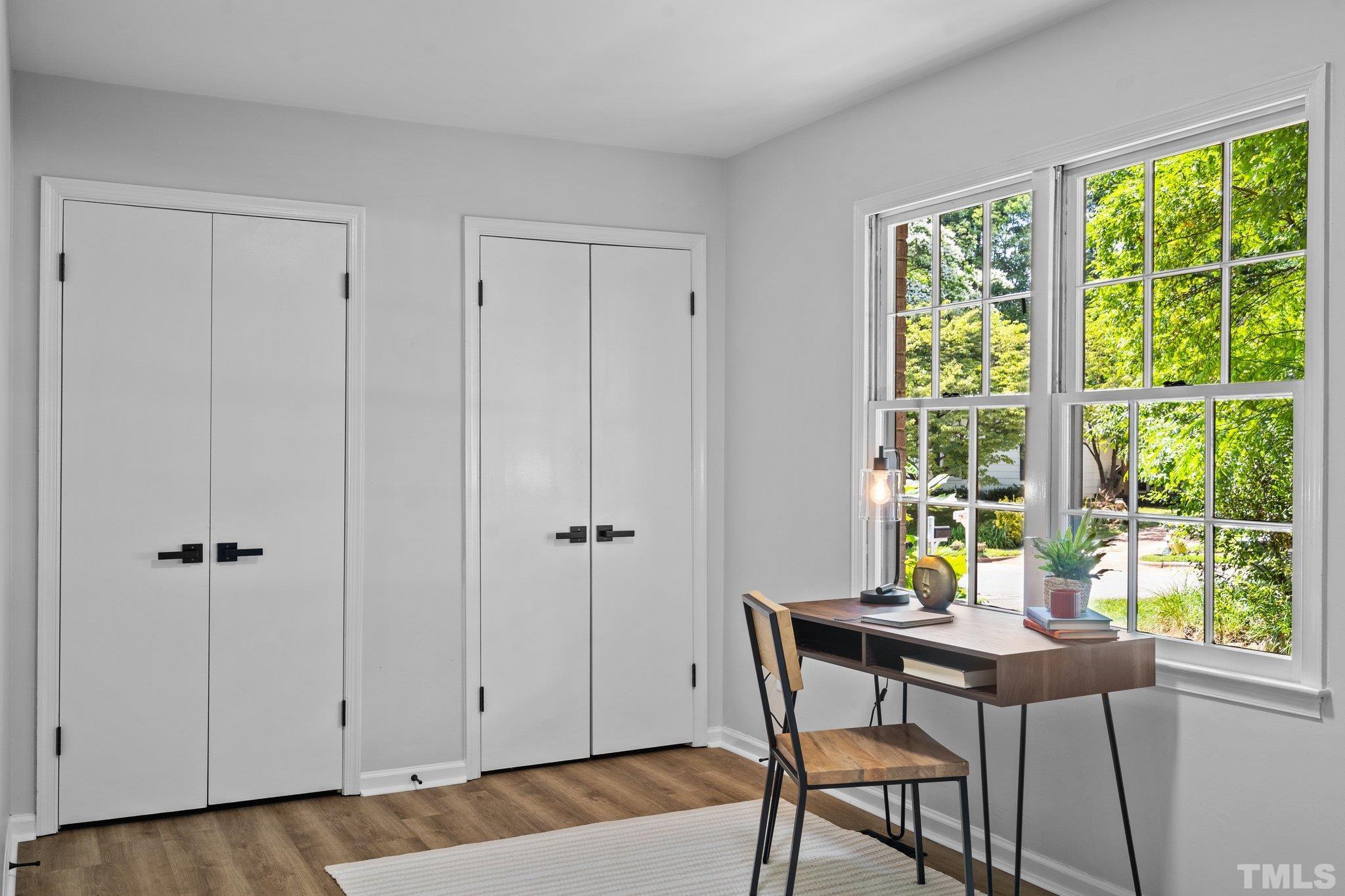 1013 Mockingbird Drive Raleigh, NC 27615 - Photo 19 of 41 a view of a workspace with furniture and a window
