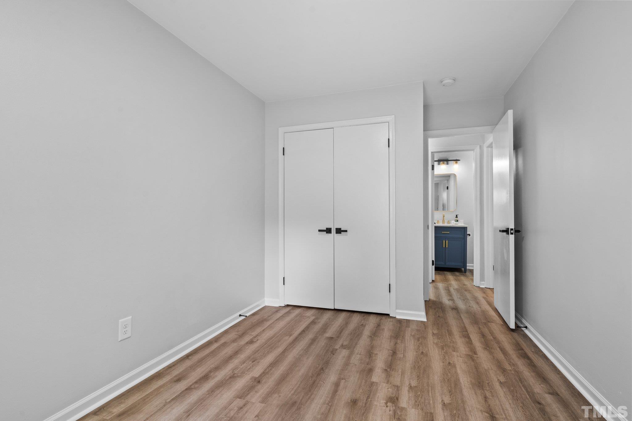 1013 Mockingbird Drive Raleigh, NC 27615 - Photo 23 of 41 a view of a room with wooden floor
