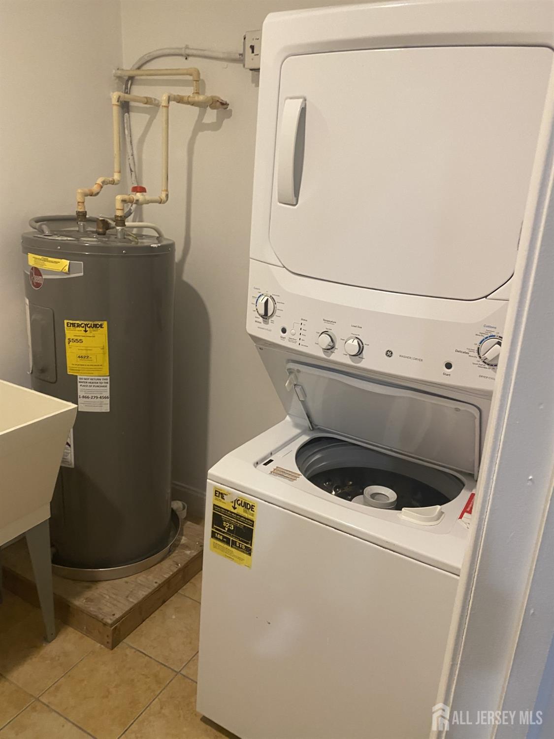 378 George Street, Unit 201 New Brunswick, NJ 08901 - Photo 9 of 10 a utility room with dryer and washer
