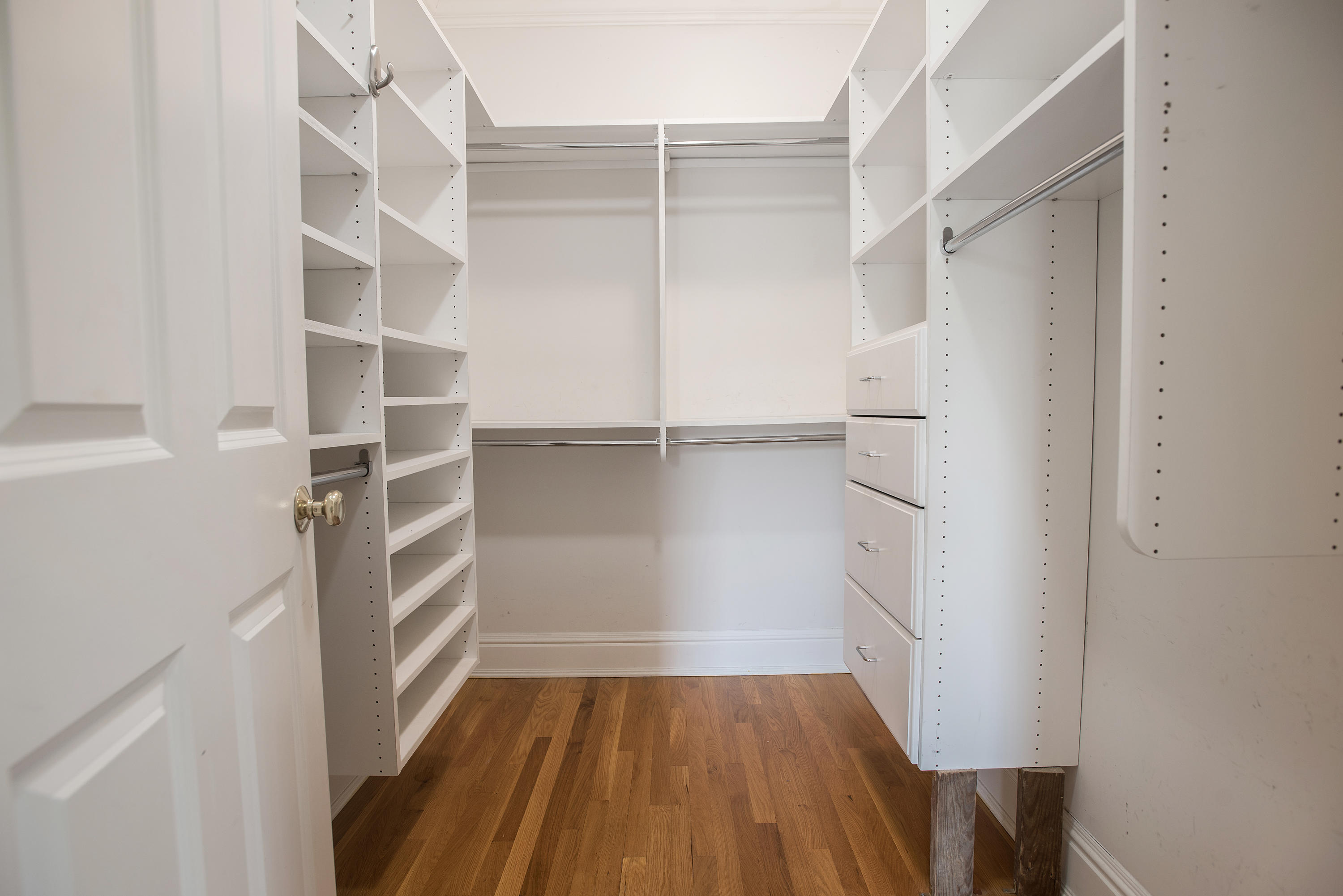 17 Brushy Ridge Road New Canaan, CT 06840 - Photo 16 of 35 a view of walk in closet with empty racks