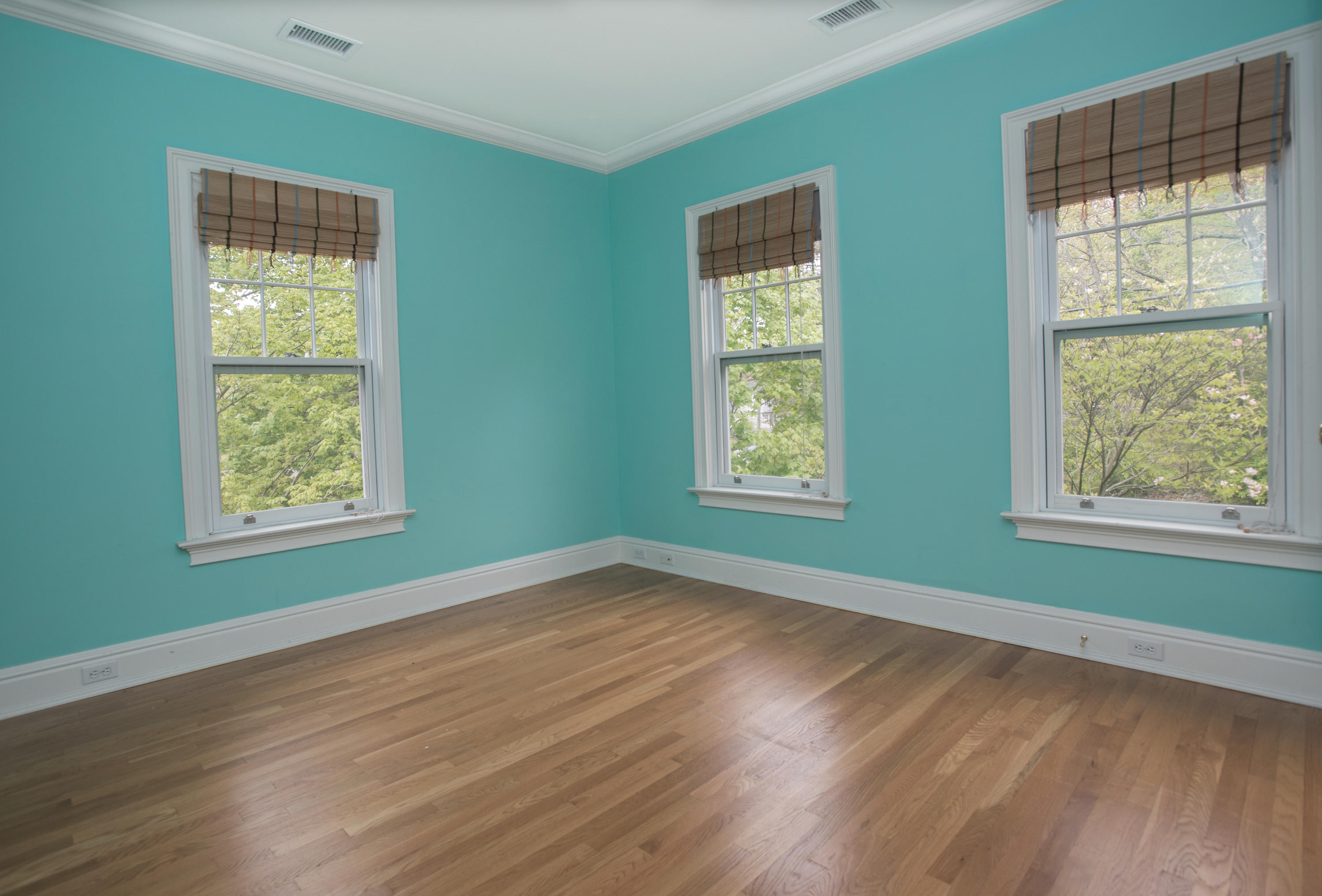 17 Brushy Ridge Road New Canaan, CT 06840 - Photo 20 of 35 a view of an empty room with wooden floor and a window