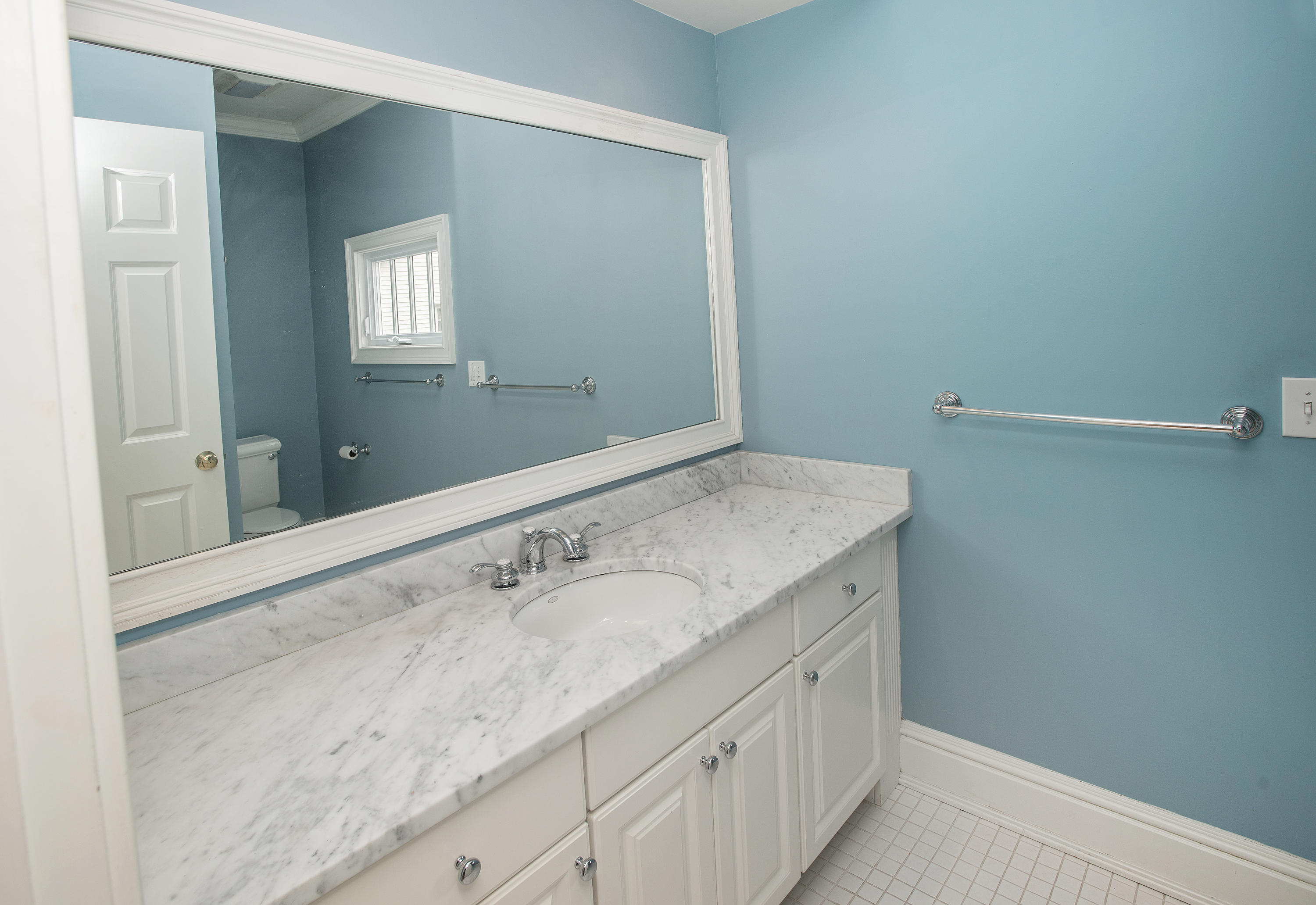 17 Brushy Ridge Road New Canaan, CT 06840 - Photo 21 of 35 a bathroom with a sink and a mirror