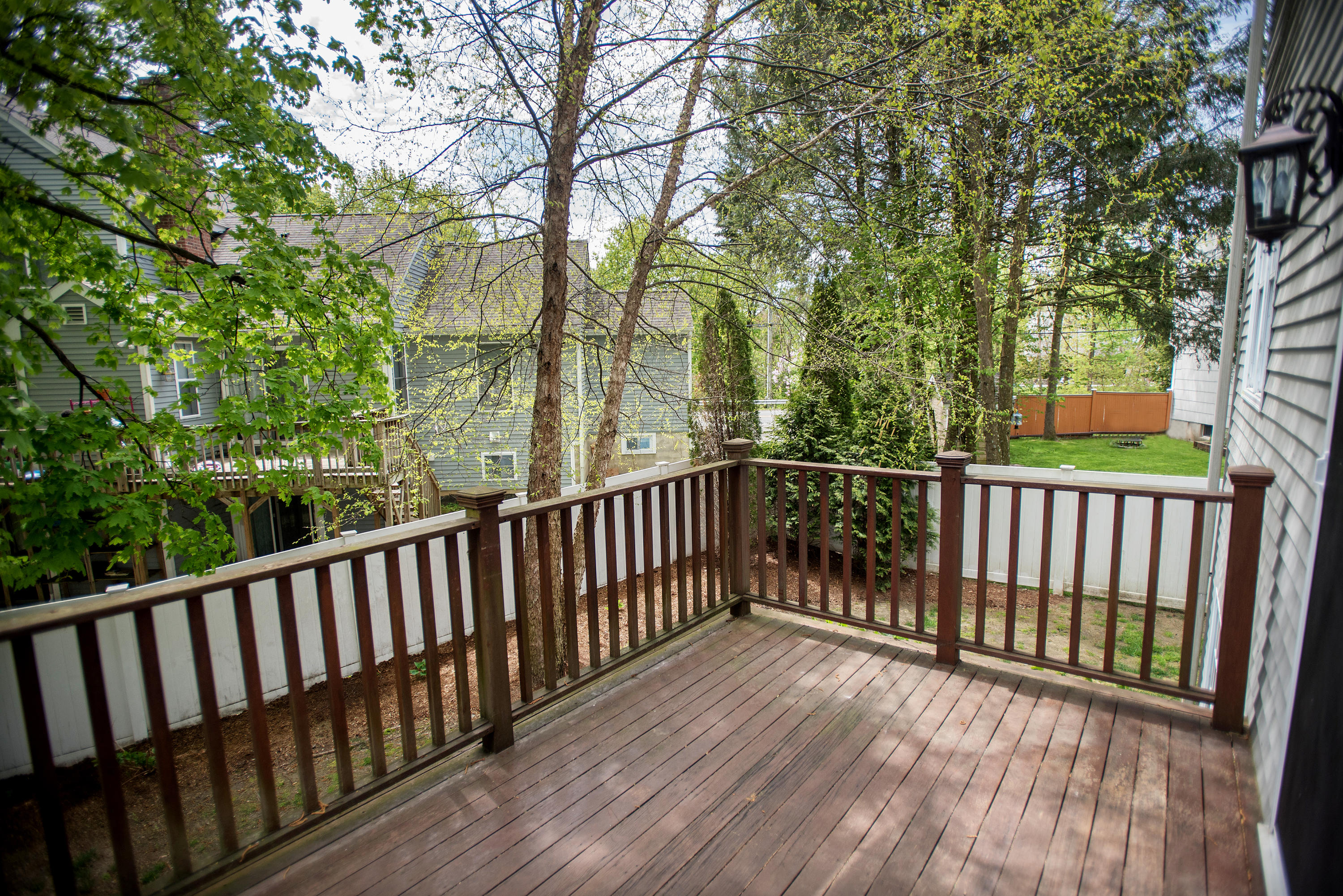 17 Brushy Ridge Road New Canaan, CT 06840 - Photo 30 of 35 a view of balcony with wooden floor and fence