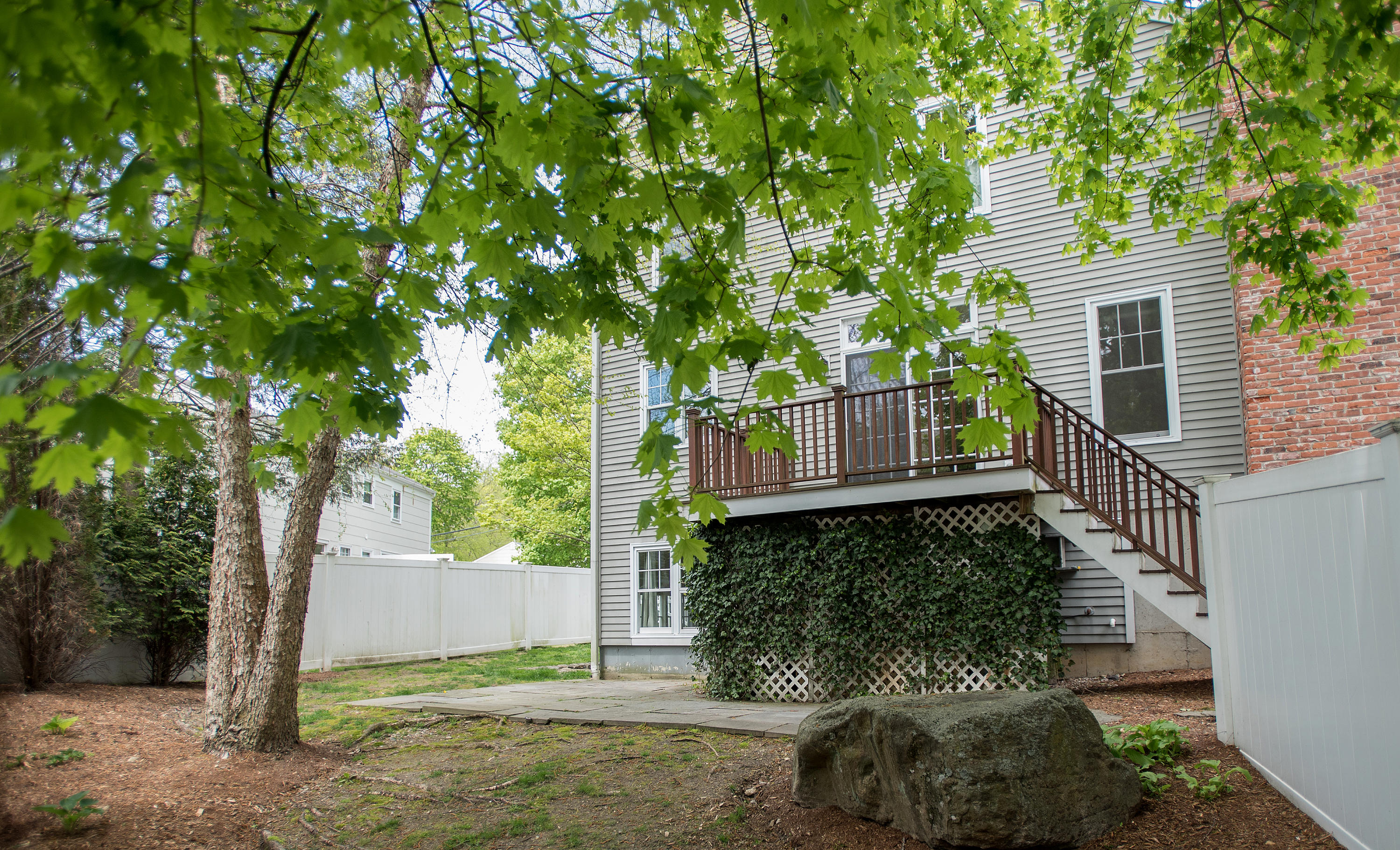 17 Brushy Ridge Road New Canaan, CT 06840 - Photo 31 of 35 a view of a house with a yard