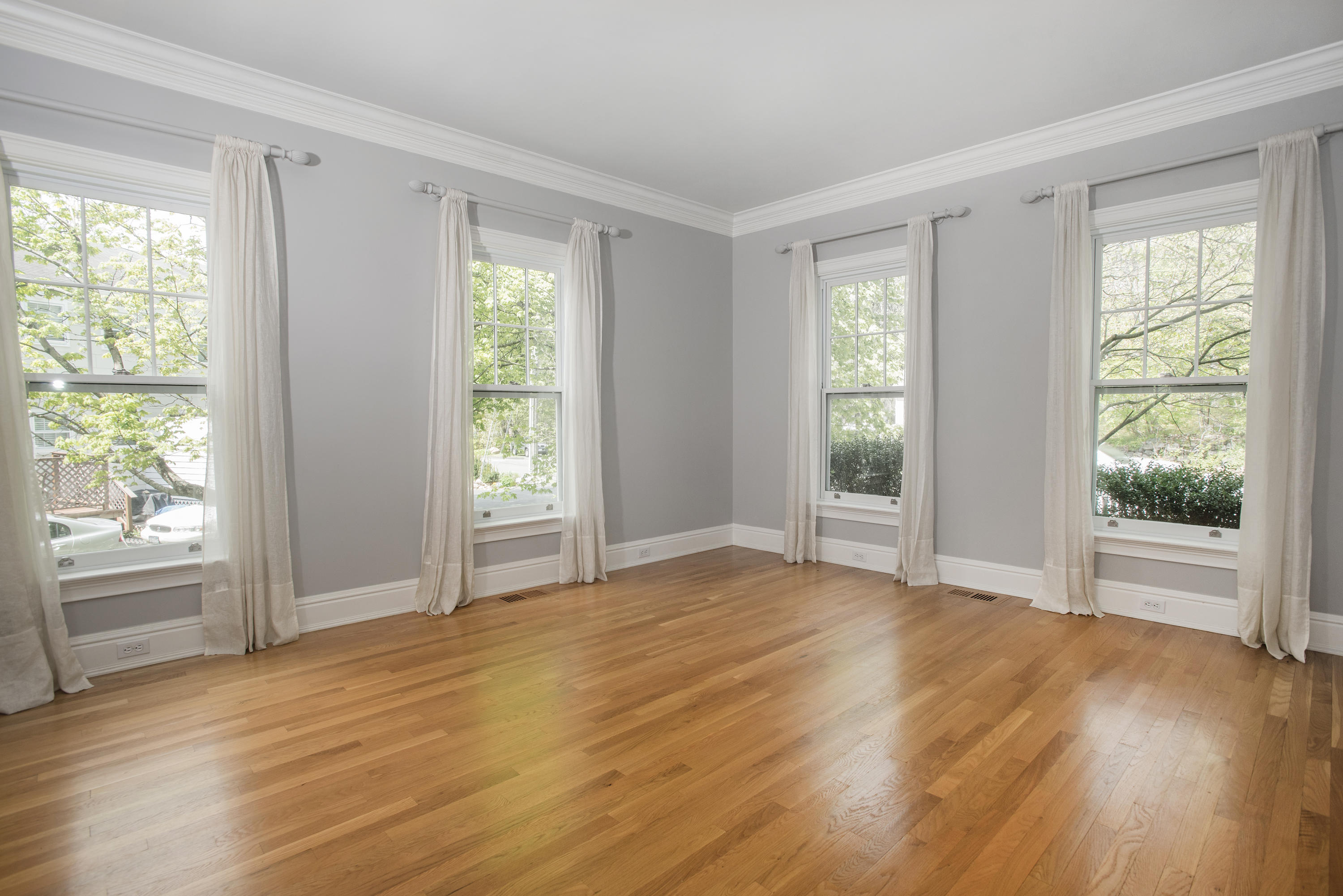 17 Brushy Ridge Road New Canaan, CT 06840 - Photo 5 of 35 a view of an empty room with wooden floor and a window