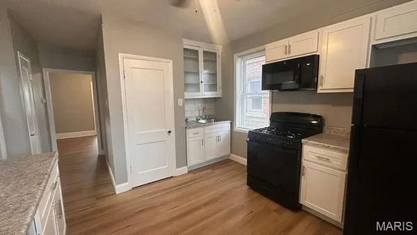 $1,000 | 5042 Pernod Avenue, Unit 1F, St. Louis, MO 63139