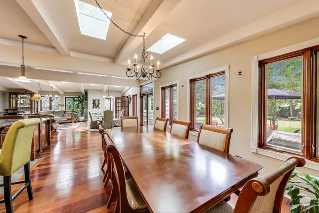 a view of a living room and kitchen with furniture fire place