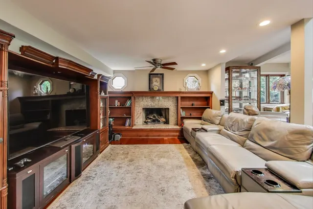 a kitchen with a refrigerator sink and cabinets